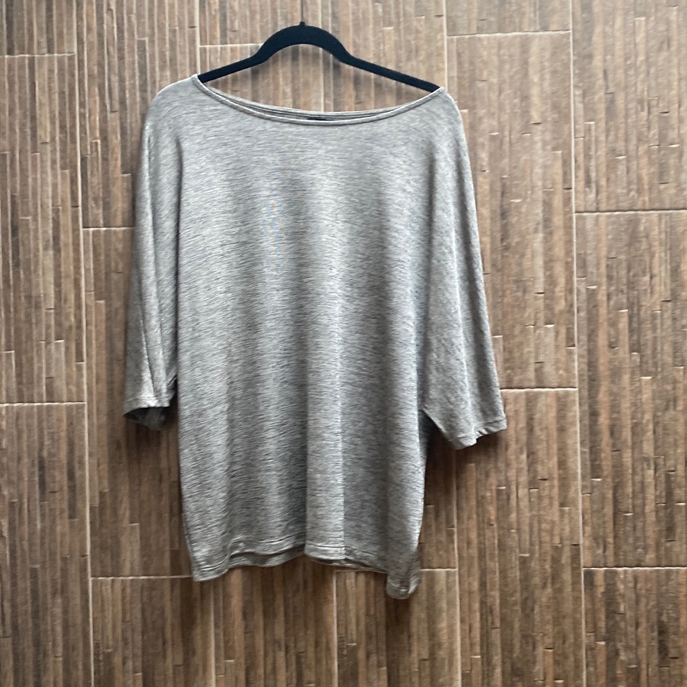 Shimmery tunic. Batwing style sleeves
